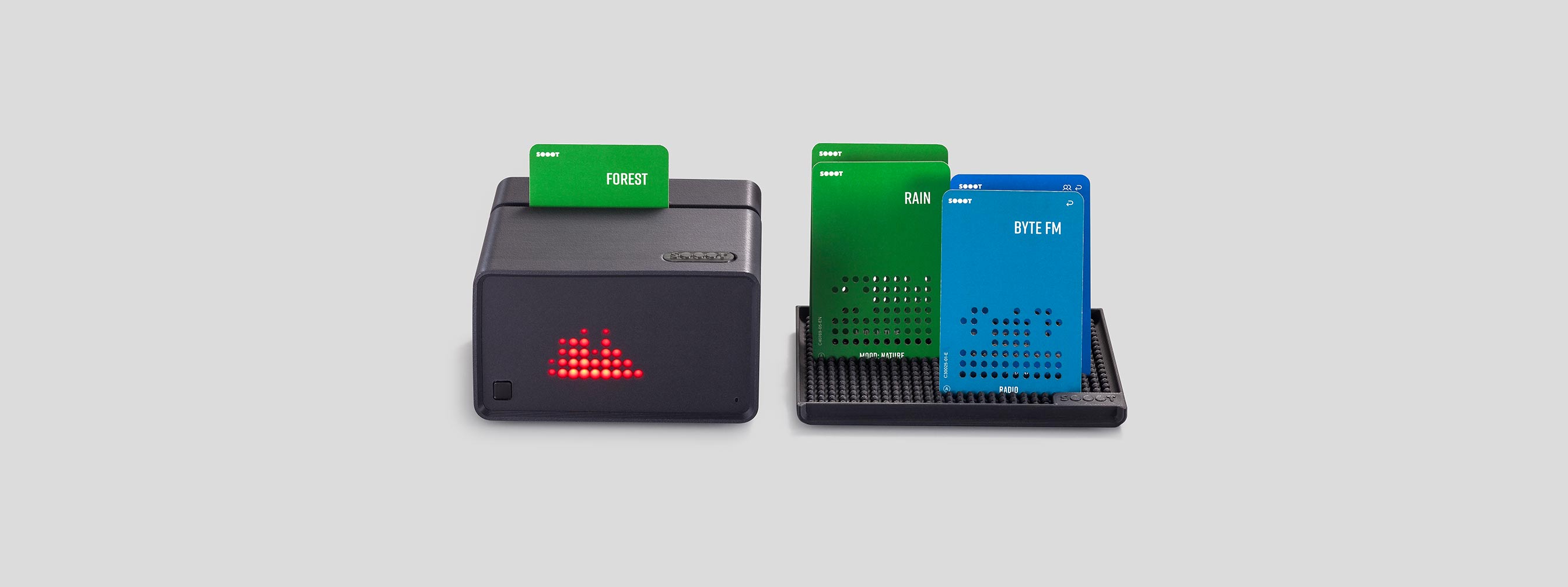SOOOT Box with a green FOREST card, RAIN and BYTE FM cards in a tray